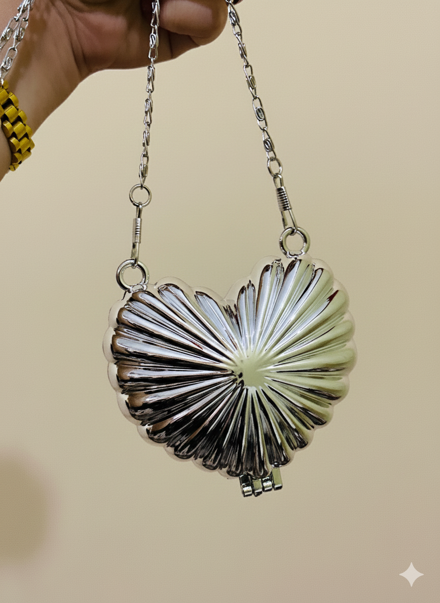 Silver heart clutch